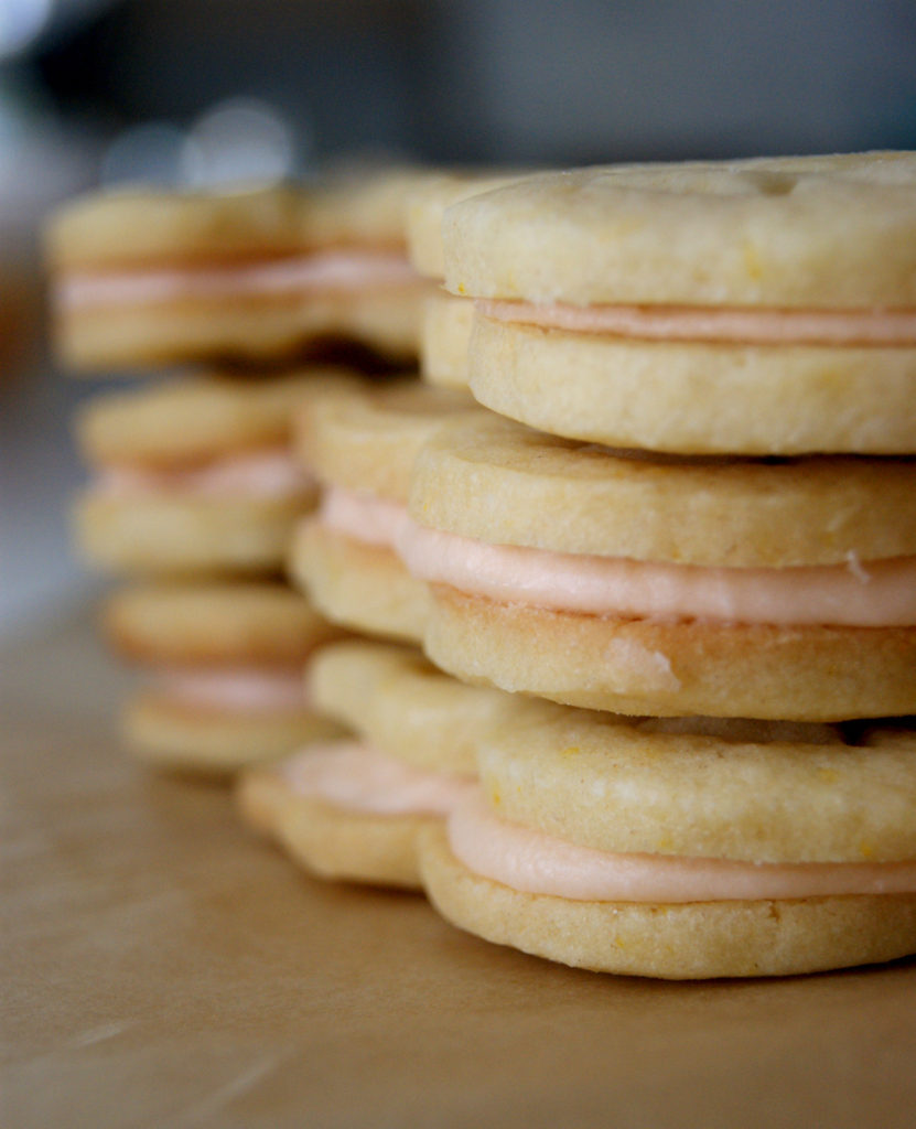 Orange cookie sandwiches